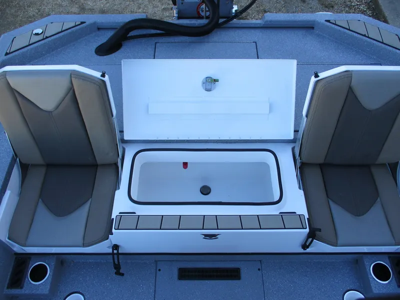 Slide: The Image of 2025 Vexus ACX 2210 boat interior with seating and storage compartment. - 10