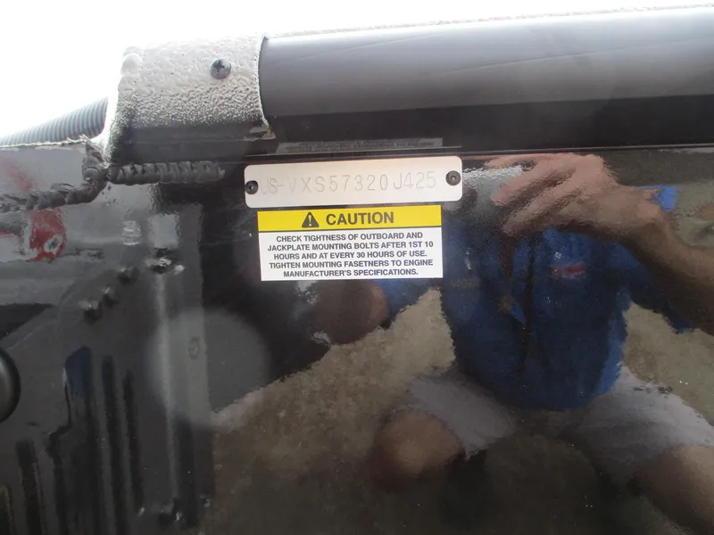 Slide: The Image of 2025 Vexus ACX 2210 caution label with reflection. - 15