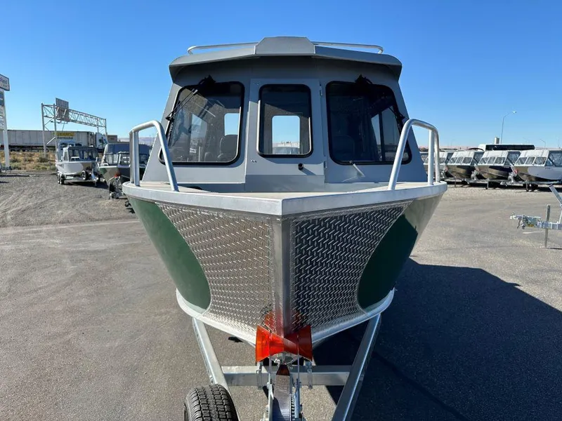 Slide: The Image of 2025 Hewescraft 220 Ocean Pro ET HT boat on trailer, front view. - 2