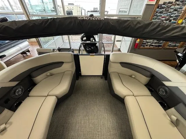 Slide: The Image of 2025 Barletta Cabrio 22 QC pontoon boat interior with plush seating and modern design. - 14