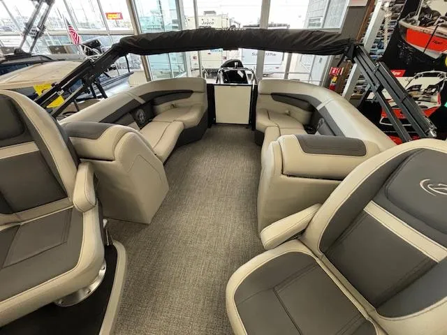 Slide: The Image of 2025 Barletta Cabrio 22 QC interior with luxurious seating and modern design. - 16