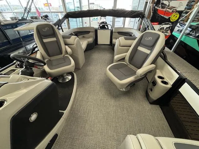 Slide: The Image of 2025 Barletta Cabrio 22 QC pontoon boat interior with plush seating and modern design. - 17