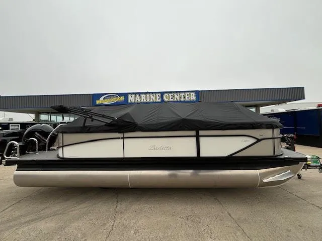 Slide: The Image of 2025 Barletta Cabrio 22 QC pontoon boat with cover at Marine Center. - 23