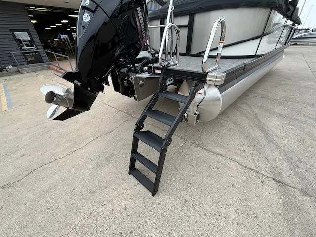 Slide: The Image of Barletta Cabrio 22 QC 2025 pontoon boat with motor and boarding ladder. - 24