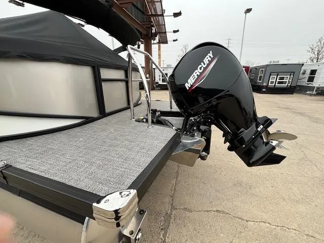 Slide: The Image of 2025 Barletta Cabrio 22 QC pontoon boat with Mercury outboard motor. - 27