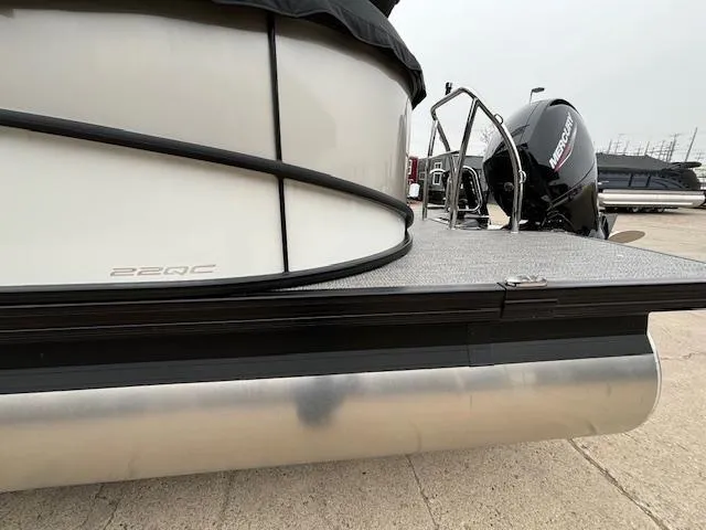 Slide: The Image of 2025 Barletta Cabrio 22 QC pontoon boat with Mercury outboard motor. - 28