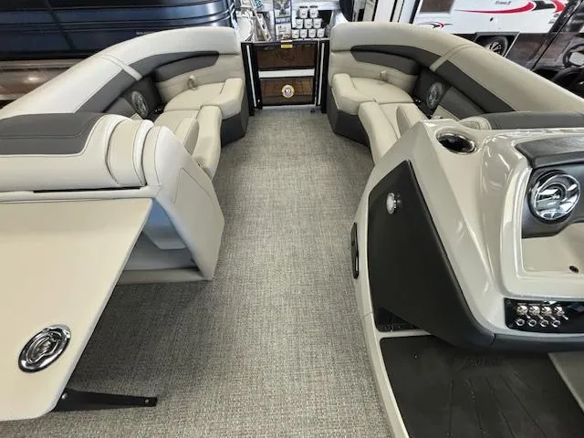 Slide: The Image of 2025 Barletta Cabrio 22 QC interior with plush seating and modern design. - 4