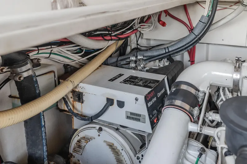 Slide: The Image of Engine room of 2006 Rampage 38 Express boat with generator and wiring. - 20