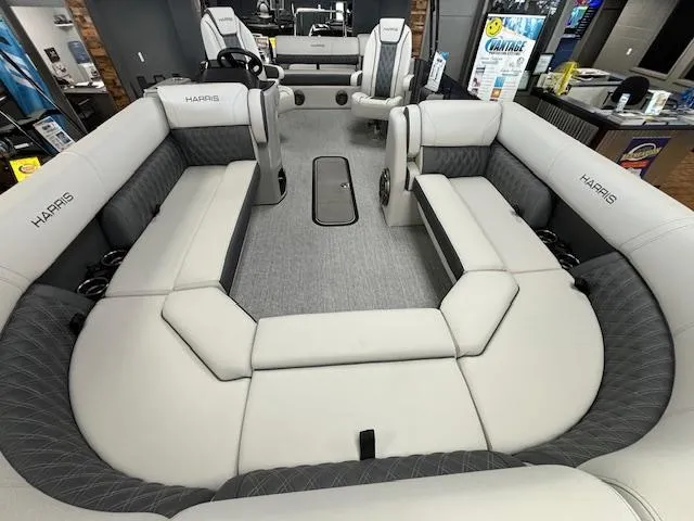 Slide: The Image of 2025 Harris SUNLINER 230 SLDH pontoon boat interior with luxurious seating and modern design. - 10