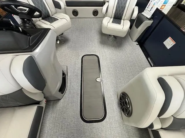 Slide: The Image of 2025 Harris SUNLINER 230 SLDH interior with modern seating and sleek design. - 12