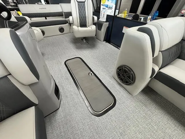 Slide: The Image of Luxurious interior of 2025 Harris SUNLINER 230 SLDH pontoon boat with plush seating. - 14