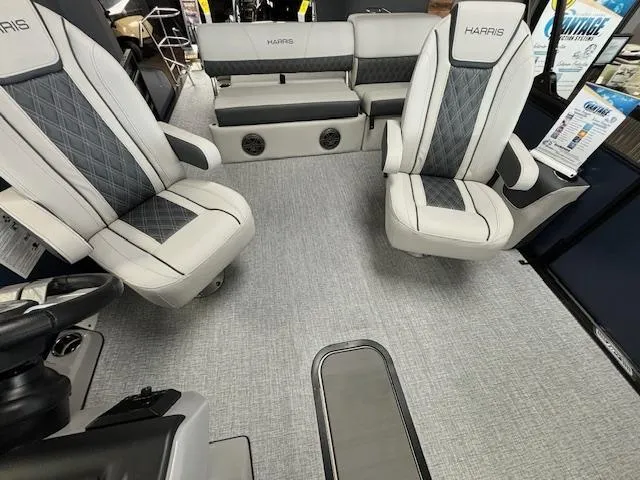 Slide: The Image of 2025 Harris SUNLINER 230 SLDH interior with luxurious seating and modern design. - 16