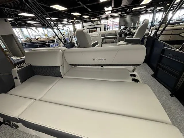 Slide: The Image of 2025 Harris SUNLINER 230 SLDH pontoon boat interior with luxurious seating. - 24