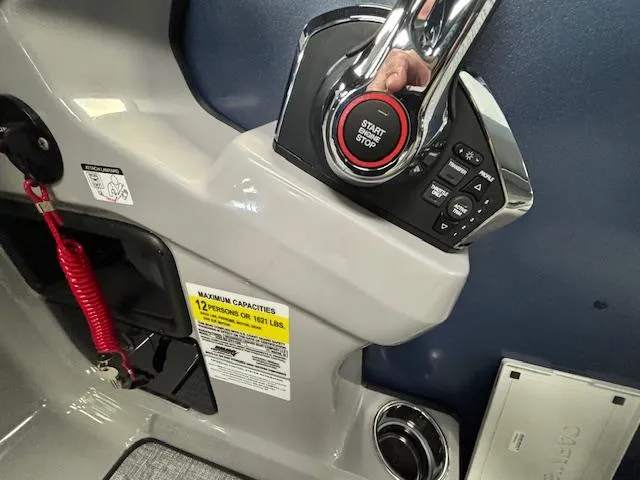 Slide: The Image of Control panel of 2025 Harris SUNLINER 230 SLDH boat with start/stop button. - 29