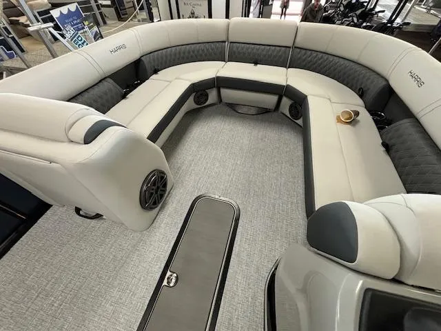 Slide: The Image of 2025 Harris SUNLINER 230 SLDH boat interior with spacious seating and modern design. - 34