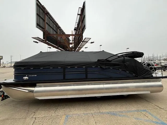 Slide: The Image of 2025 Harris SUNLINER 230 SLDH pontoon boat covered, parked outdoors. - 36