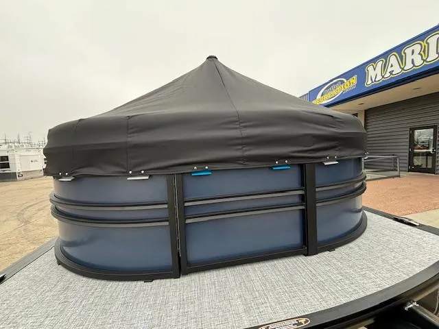 Slide: The Image of 2025 Harris SUNLINER 230 SLDH with covered top, displayed at marina. - 7