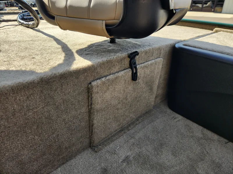 Slide: The Image of 2025 Tracker Bass Tracker Classic XL Limited boat interior with storage compartment. - 21