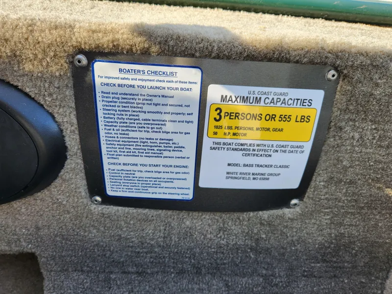 Slide: The Image of Boater's checklist and capacity label on 2025 Tracker Bass Tracker Classic XL Limited. - 23