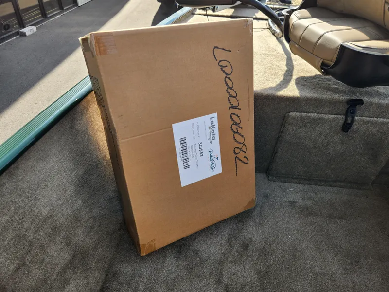 Slide: The Image of Cardboard box inside 2025 Tracker Bass Tracker Classic XL Limited boat. - 25