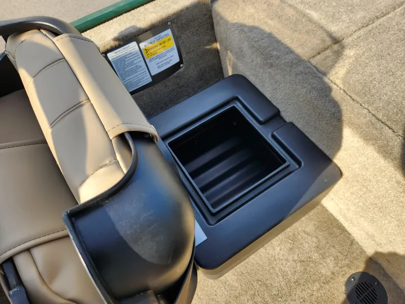 Slide: The Image of 2025 Tracker Bass Tracker Classic XL Limited boat interior with storage compartment. - 9