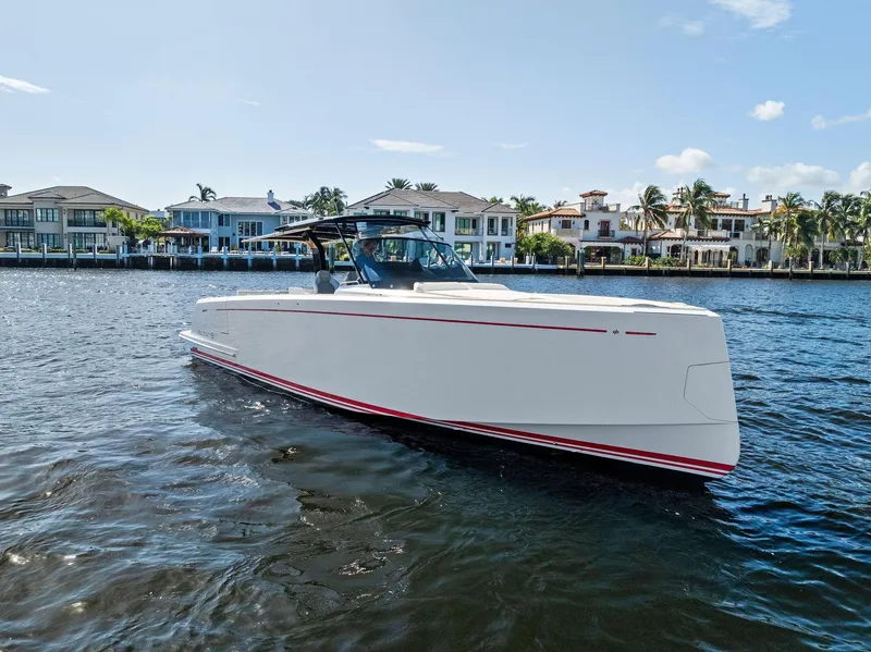Slide: The Image of 2021 Pardo Yachts 38 cruising on a sunny waterfront. - 13