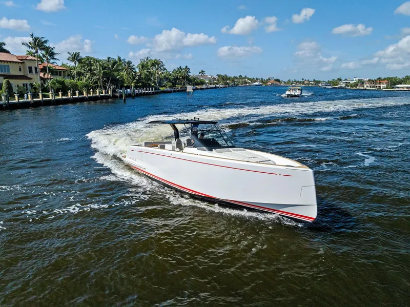 Slide: The Image of 2021 Pardo Yachts 38 cruising on a sunny day in a scenic waterway. - 21