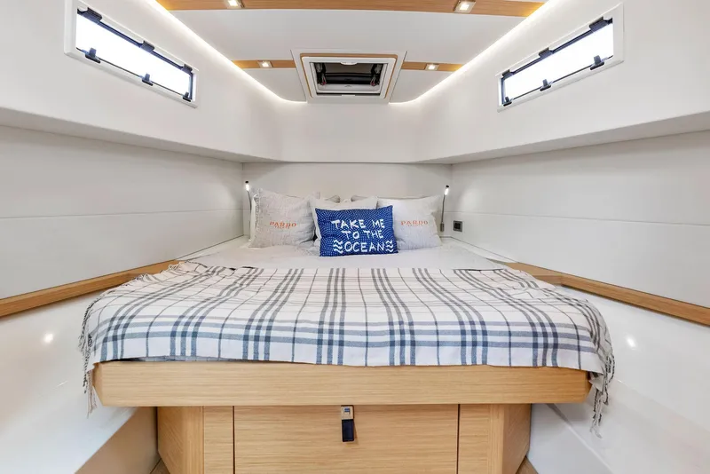 Slide: The Image of Luxurious cabin interior of 2021 Pardo Yachts 38 with cozy bedding and modern design. - 24