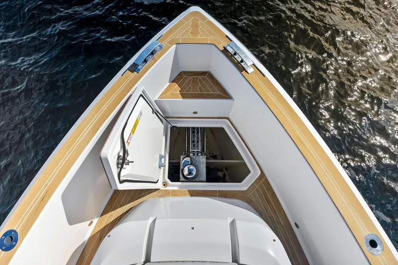 Slide: The Image of Pardo Yachts 38 (2021) bow view with open storage compartment on water. - 33