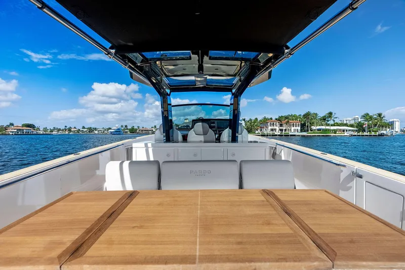 Slide: The Image of 2021 Pardo Yachts 38 with spacious deck and seating, cruising on a sunny day. - 42