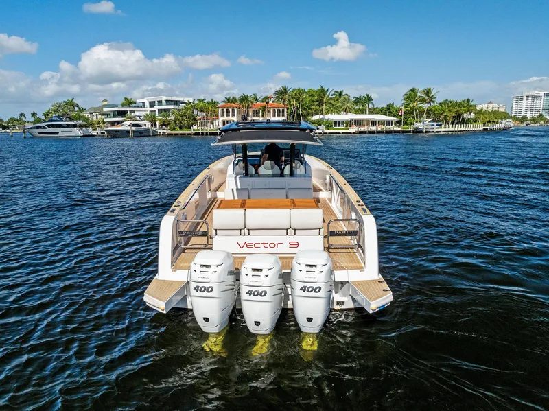 Slide: The Image of 2021 Pardo Yachts 38 with triple 400 engines cruising on a sunny day. - 9