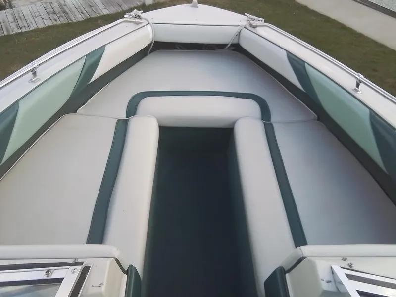 Slide: The Image of 1988 Sea Ray 20 Seville boat interior with cushioned seating. - 10