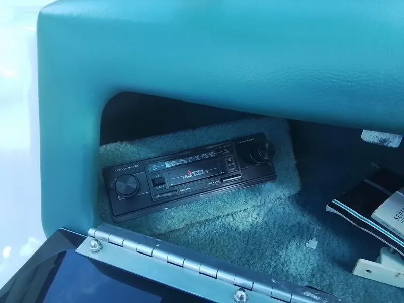 Slide: The Image of 1988 Sea Ray 20 Seville boat interior with vintage stereo system. - 19