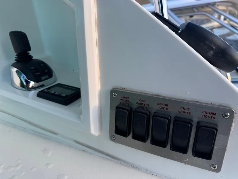 Slide: The Image of Control panel and joystick on 2018 Cruisers Yachts 50 Cantius boat. - 7