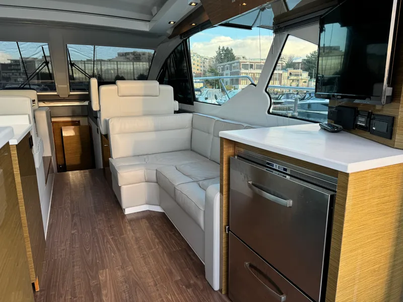 Slide: The Image of Luxurious interior of 2018 Cruisers Yachts 50 Cantius with modern seating and appliances. - 9