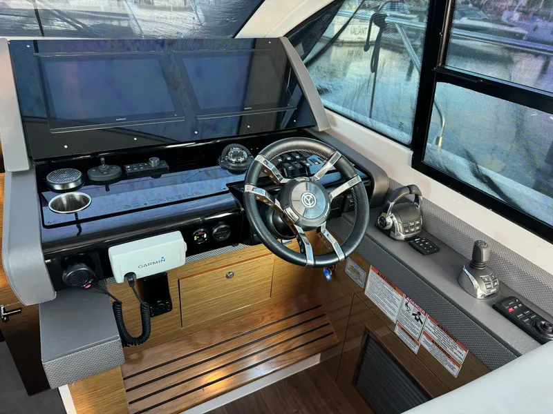 Slide: The Image of Helm of 2018 Cruisers Yachts 50 Cantius with Garmin navigation system. - 13