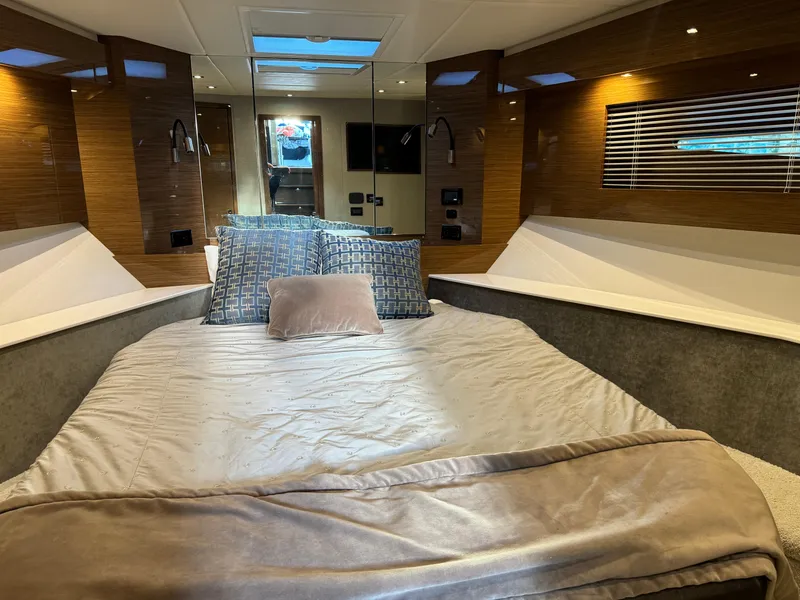 Slide: The Image of Luxurious bedroom interior of 2018 Cruisers Yachts 50 Cantius with elegant bedding and modern design. - 15