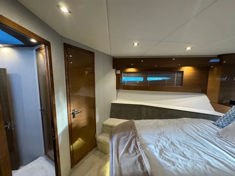Slide: The Image of Luxurious interior of 2018 Cruisers Yachts 50 Cantius with modern design and cozy bedroom. - 18