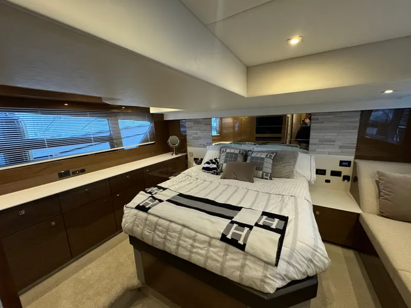 Slide: The Image of Luxurious bedroom interior of 2018 Cruisers Yachts 50 Cantius with modern decor and cozy bedding. - 20