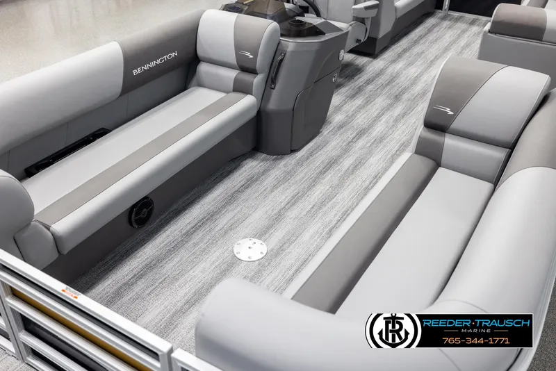 Slide: The Image of 2025 Bennington 23 SSRSE pontoon boat interior with gray seating and modern design. - 10