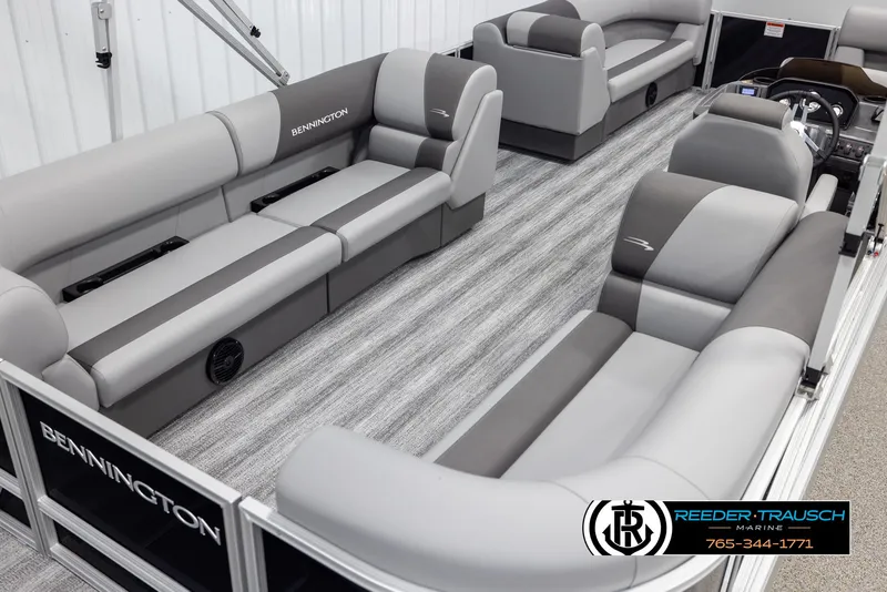 Slide: The Image of 2025 Bennington 23 SSRSE pontoon boat interior with gray seating and modern design. - 12