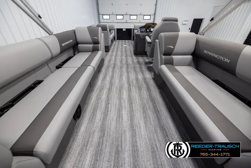 Slide: The Image of Interior of 2025 Bennington 23 SSRSE pontoon boat with gray seating and modern design. - 16