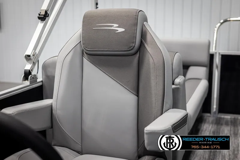 Slide: The Image of 2025 Bennington 23 SSRSE boat seat, gray upholstery, Reeder-Trausch Marine logo visible. - 33