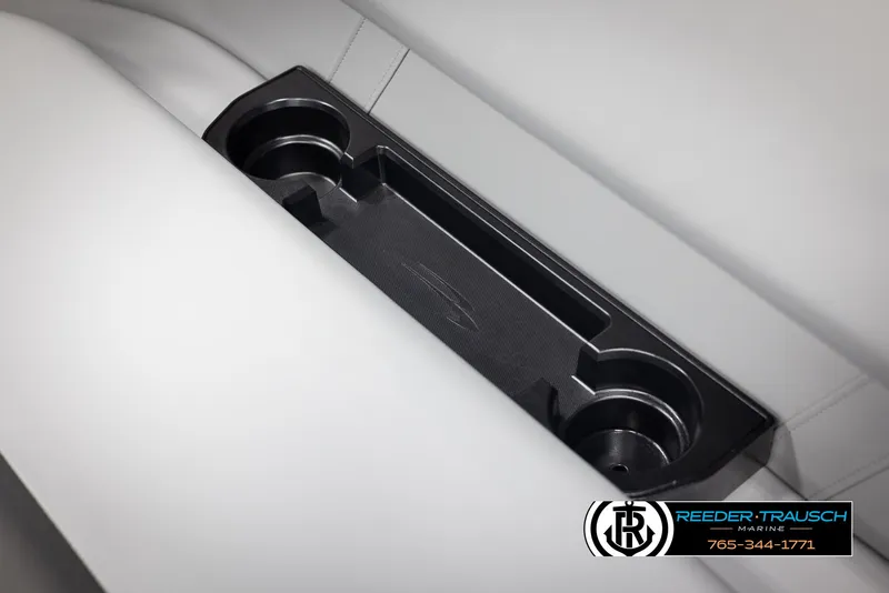 Slide: The Image of 2025 Bennington 23 SSRSE boat cup holders on white leather seating. - 35