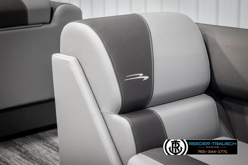 Slide: The Image of 2025 Bennington 23 SSRSE boat seat with gray and black upholstery, Reeder-Trausch Marine logo. - 39