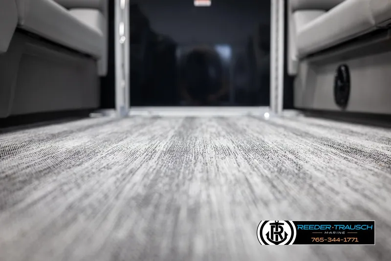 Slide: The Image of Interior view of 2025 Bennington 23 SSRSE boat, featuring textured flooring. - 40
