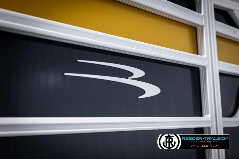 Slide: The Image of 2025 Bennington 23 SSRSE boat detail with logo and Reeder-Trausch Marine contact information. - 41