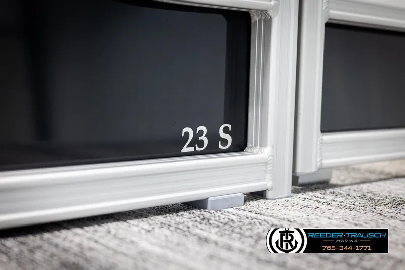 Slide: The Image of 2025 Bennington 23 SSRSE boat detail with Reeder-Trausch Marine logo. - 42
