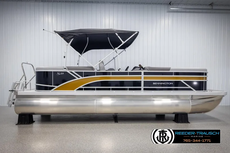 Slide: The Image of 2025 Bennington 23 SSRSE pontoon boat with canopy in showroom. - 5