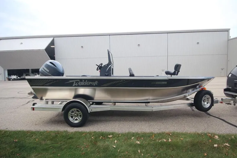 Slide: The Image of 2025 Weldcraft 200 Rebel Open boat with F150hp engine on trailer. - 6
